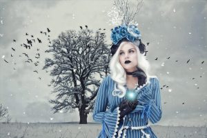 gothic woman on snow with black birds
